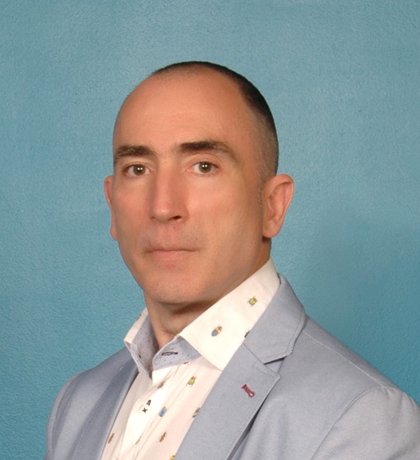 Dr. Evangelos Melas Dr. Evangelos Melas
